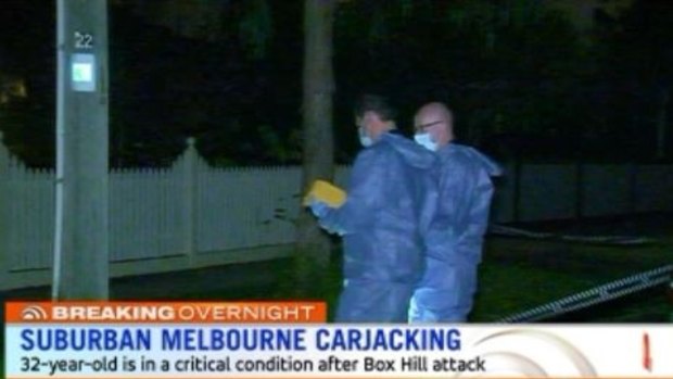 Police investigate the Box Hill carjacking.