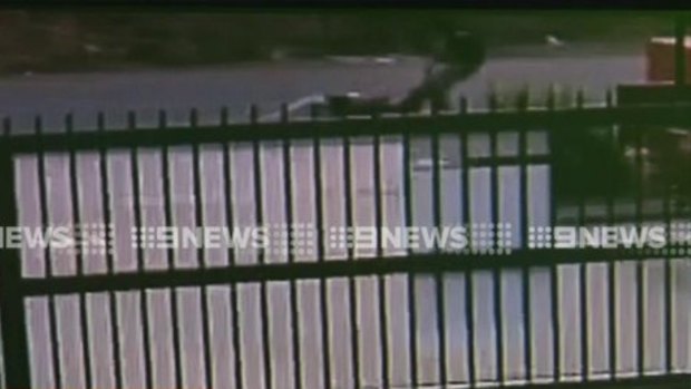 CCTV footage shows the woman being dragged along the road by the man.