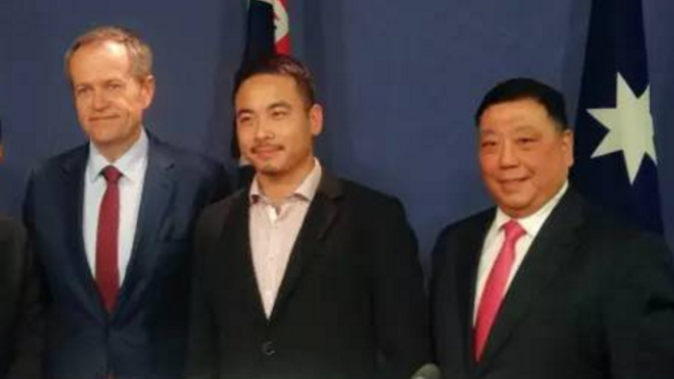 Opposition Leader Bill Shorten, second from left, with Simon Zhou, second from right, who has been elected as an independent to Ryde council in Sydney, and NSW Labor MP Ernest Wong, right, at a 2016 election press conference. 