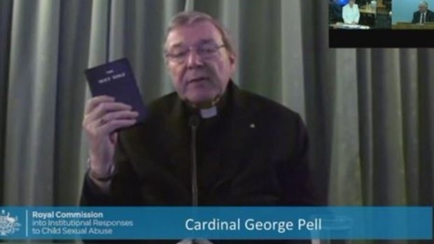 Cardinal George Pell testifies at the hearing in Rome.