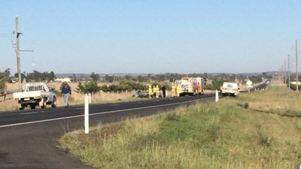 A man has died in a single-vehicle rollover near Toowoomba, which also injured a woman and two children.