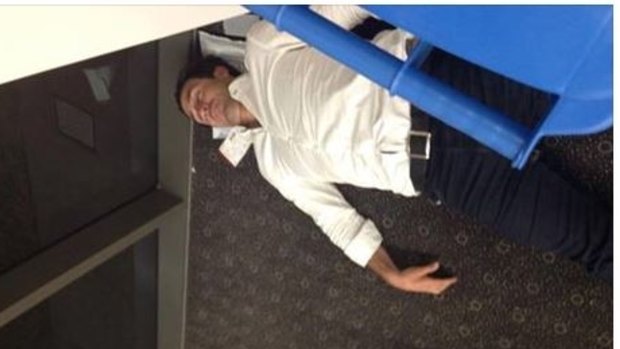 Bad form: The Facebook post of Andrew Johns asleep in Toowoomba Airport.
