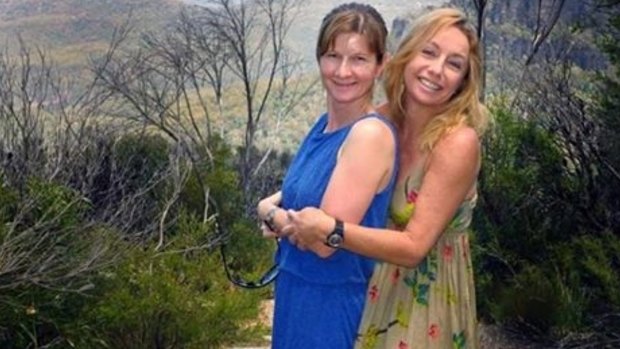 Childhood friends Cindy Waldron, who is presumed dead after a crocodile attack, and Leeann Mitchell, who tried to save her.