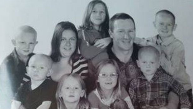Rebecca and Christopher Lambkin with their seven children.