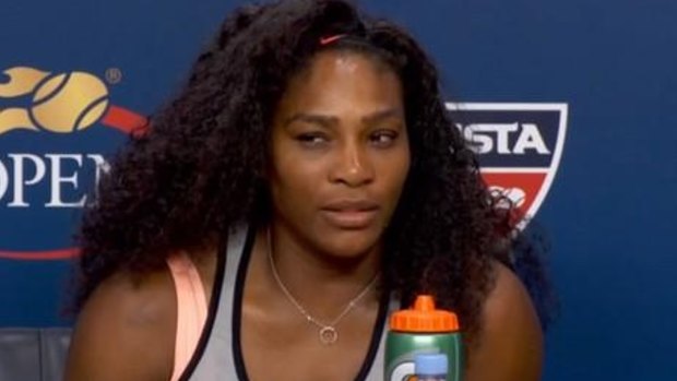 Not in a smiling mood: Serena Williams after beating her sister Venus.