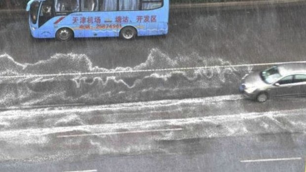 A foam residue on the streets of Tianjin after recent rains is causing public concern.