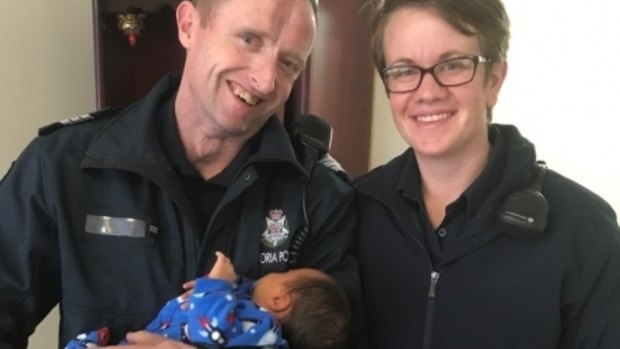 Sergeant Christopher White and Constable Alice Campbell reunited with the baby boy they helped saved.