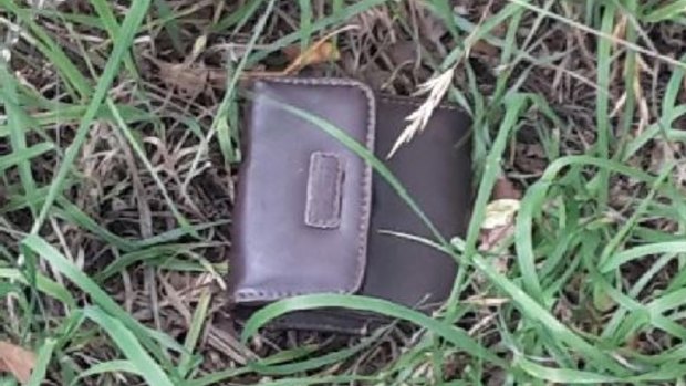 A brown 'Rosetti' purse located in the laneway between 108 and 110 Badimara Street, Fisher.