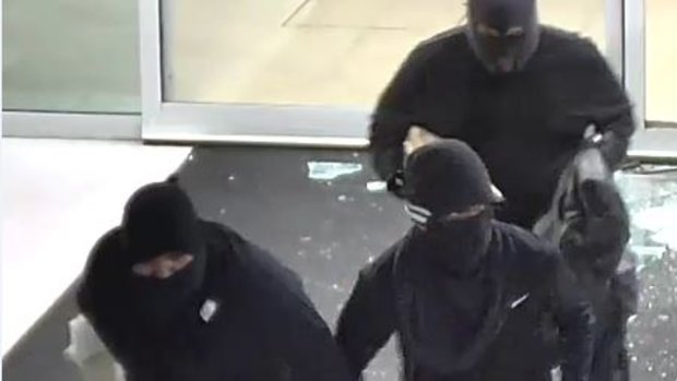 The men kept their faces covered during the burglaries.