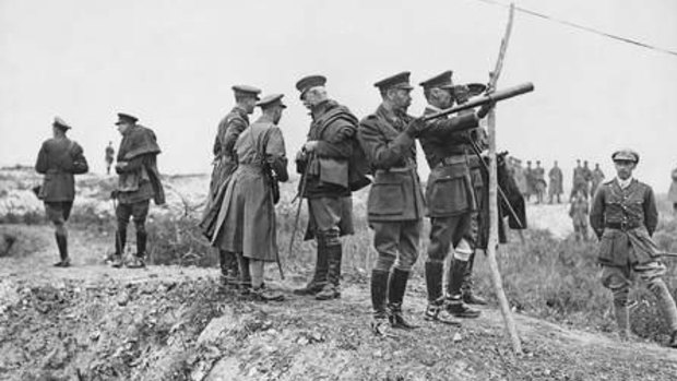 King George V, holding telescope, watching the battle of Pozieres from captured ground. 
