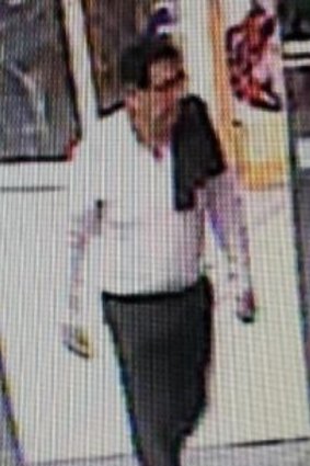 Police are seeking a man who allegedly stole an elderly woman's handbag from hospital.
