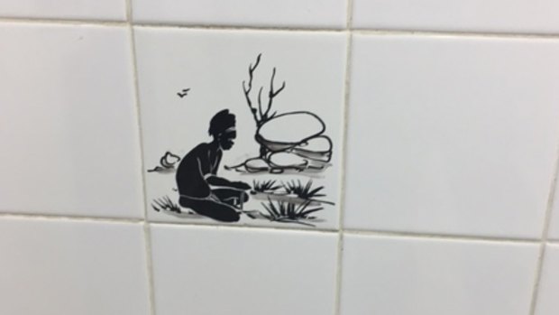 A photograph supplied by ACT Labor politician Bec Cody showing one of the tiles in the  men's urinal at the Sussex Inlet RSL, which she says is a disgrace.