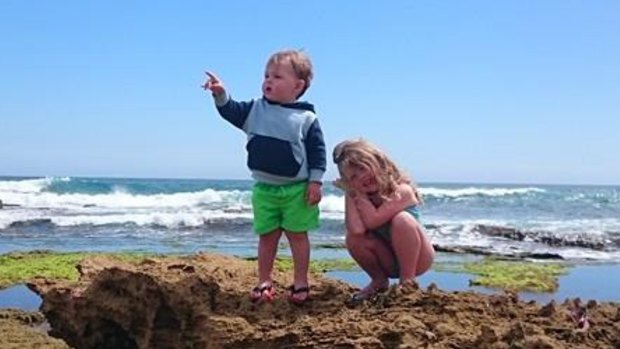 Toddler Eli Marnock, left, pictured with his sister Nicola in a family  photo. 