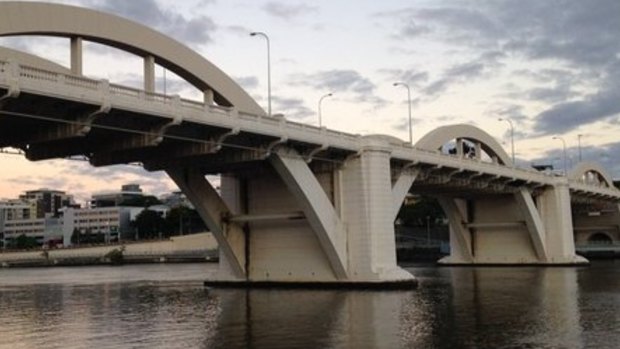 Police are searching the Brisbane River after a man was last seen jumping off the William Jolly Bridge.