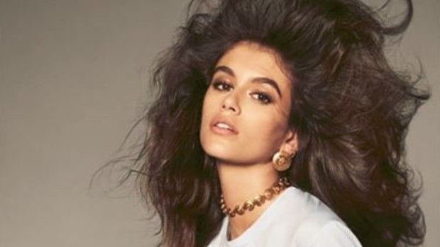 Kaia Gerber, seen here modelling for Versace, is designing a capsule collection with Karl Lagerfeld.