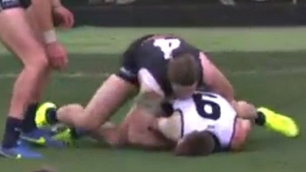Port Adelaide's Robbie Gray didn't return after this tackle by Carlton's Bryce Gibbs.
