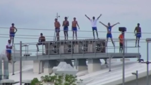 The youths stayed on the roof of the centre overnight.