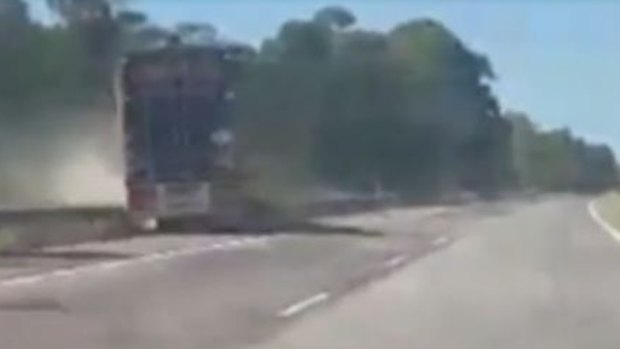 Channel Nine obtained video shot by a young woman of a truck crashing through an embankment on the M1 on Wednesday afternoon.