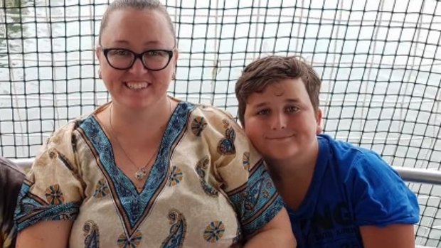 Melissa Teasdale with her son Ryan, 11, who died in Unanderra while boogie-boarding in a local park in the rain.