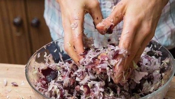 Toss the vegetables, salt, herbs and spices together thoroughly using your hands.