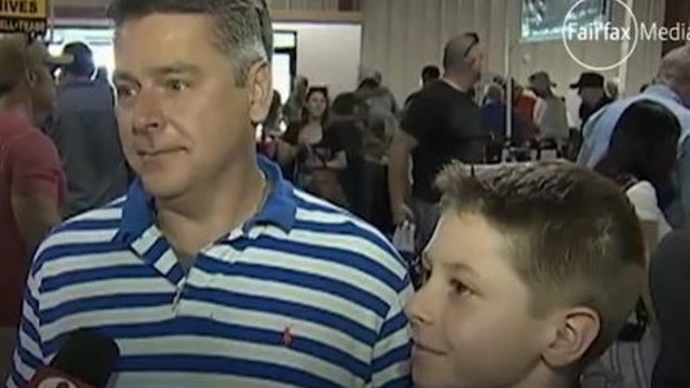 Father and son attend the gun show in Orlando looking to protect themselves.