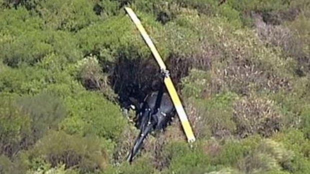 The helicopter became stuck in thick bushland. 