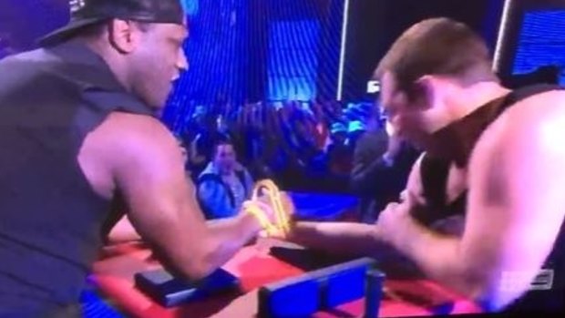 Wendell Sailor and Ben Ross arm-wrestle on <i>The Footy Show</i> on Thursday night.