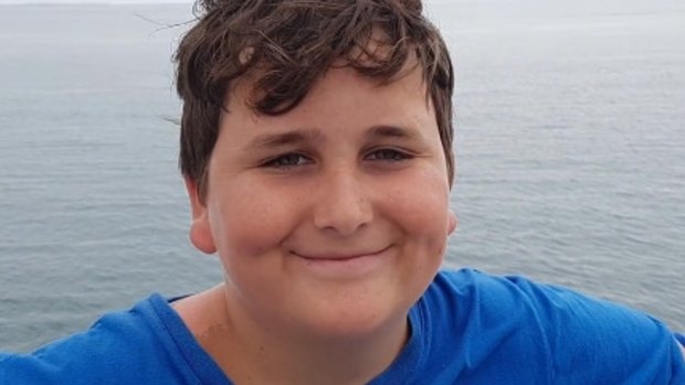 Ryan Teasdale, 11, died in Unanderra while boogie-boarding in a local park in the rain.