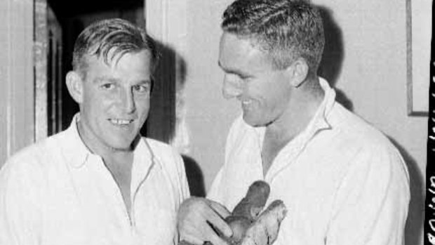 Wally Grout and Alan Davidson share a laugh in the SCG change rooms in 1961.