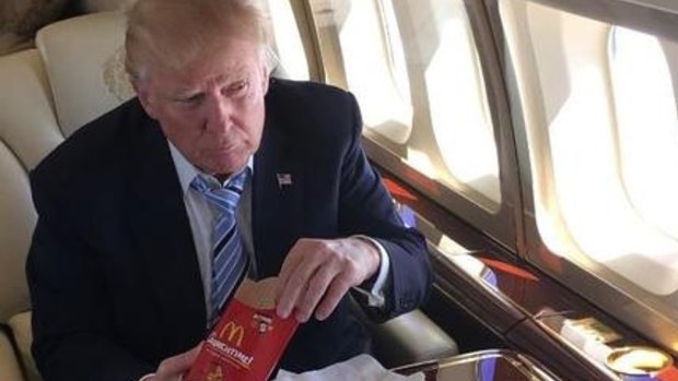 An Instagram photo of President Donald Trump eating McDonalds.