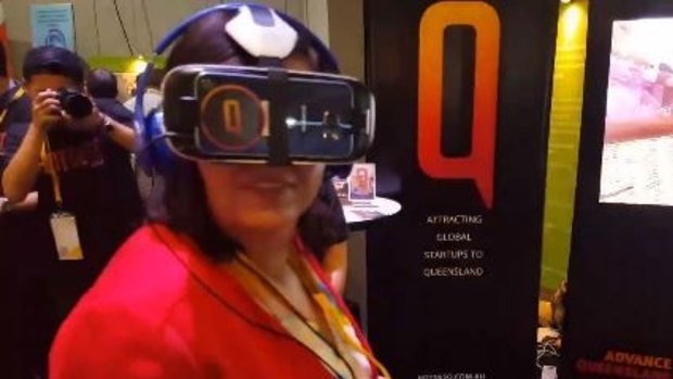 Innovation Minister Leanne Enoch views new tourism destinations with special 3D headgear.