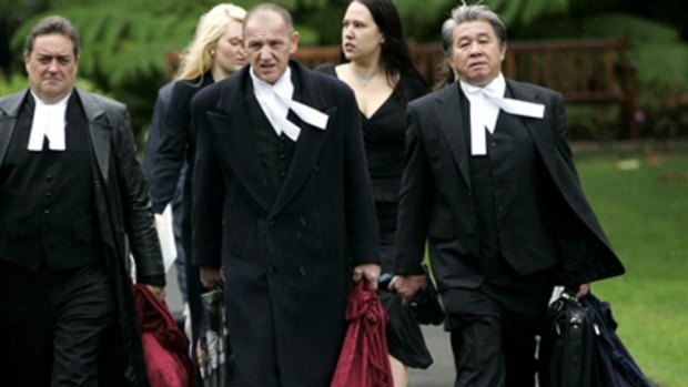 Perth lawyer Tom Percy QC (center).