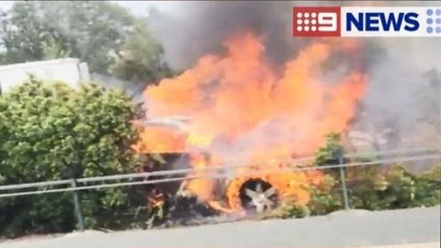 A truck burns on the M1 near Oxenford.