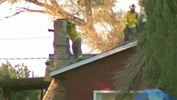 A man died after becoming stuck in a chimney, and the homeowner lit a fire. 