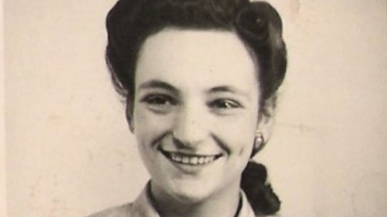 A passport photo of Mira Unreich, aged in her late 20s.