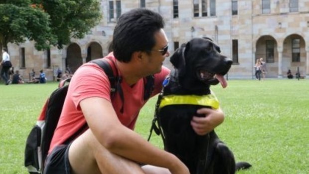 Jefferson is studying for his masters in clinical psychology at the University of Queensland with the help of his four-year-old black labrador, Ice.