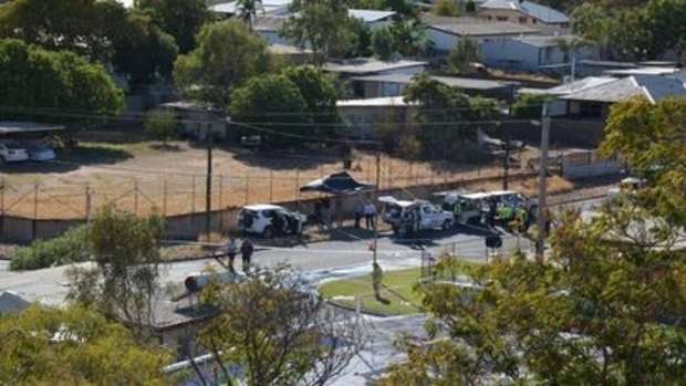 Police in the exclusion zone around Deighton Street after the Mount Isa caravan explosion on Tuesday morning.