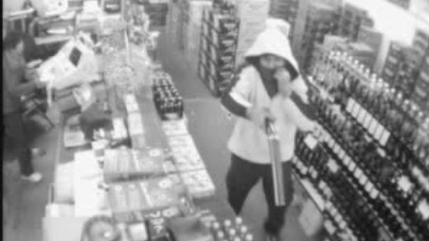 A CCTV image released by police of a hold-up of a Kingsville bottle shop in 2011. 