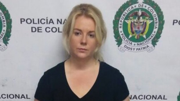 Colombian police released this photo of Cassandra Sainsbury with the drugs she is said to have smuggled.