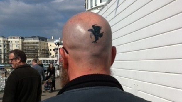 Alan Stokes' head tattoo.