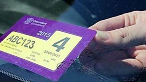 Queensland car registrations will increase but the vote came down to the wire in Parliament.