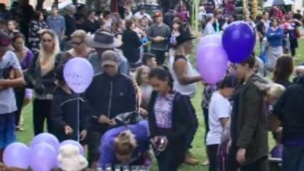 Hundreds attended a candlelight vigil for the 12-year-old, who was found dead at Pimpama.