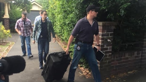Police raiding Craig Steven Wright's Sydney home in December 2015.