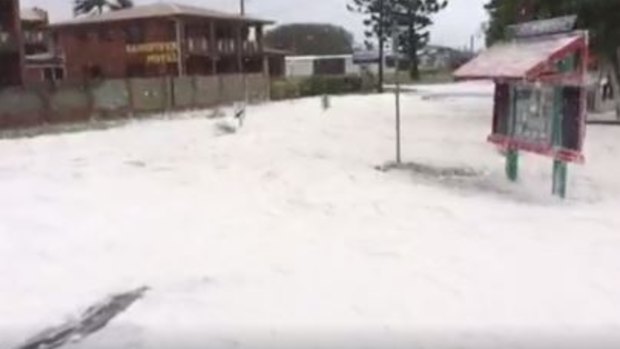 "Snow" appears to fall from the sky in Sarina as a result of Cyclone Debbie.