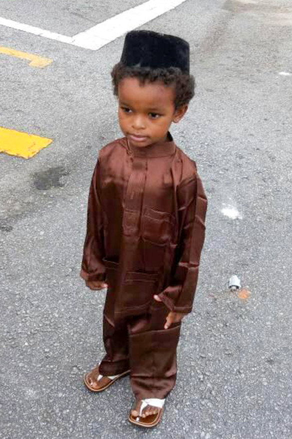 Adoum’s son, pictured in Malaysia, where the family lived before coming to Australia for her husband’s PhD study.