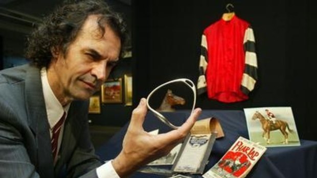 Memorabilia expert Tom Thompson with Phar Lap objects.