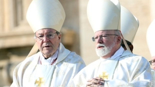 Cardinal George Pell (left) and Archbishop of Boston Cardinal Sean Patrick O'Malley attend the closing of the Jubilee of Mercy in St Peter's Square on November 20, 2016.