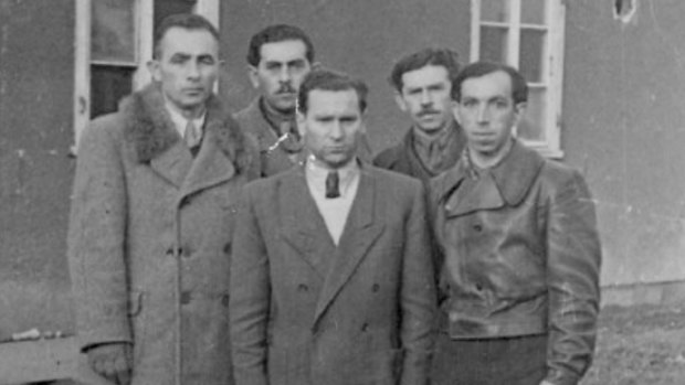 Josh Frydenberg's great-uncle Hersz, centre, with fellow Auschwitz survivors.
