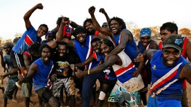 The Punmu Bulldogs of the Western Desert celebrate a victory.