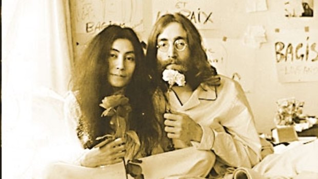 John Lennon and Yoko  'giving peace a chance" in their bed-in.